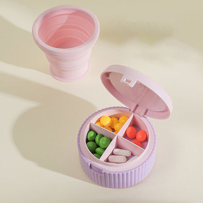 Pilleholder med sammenleggbar silikonkop